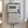 Electricity meter on a wall, example of an energy bill